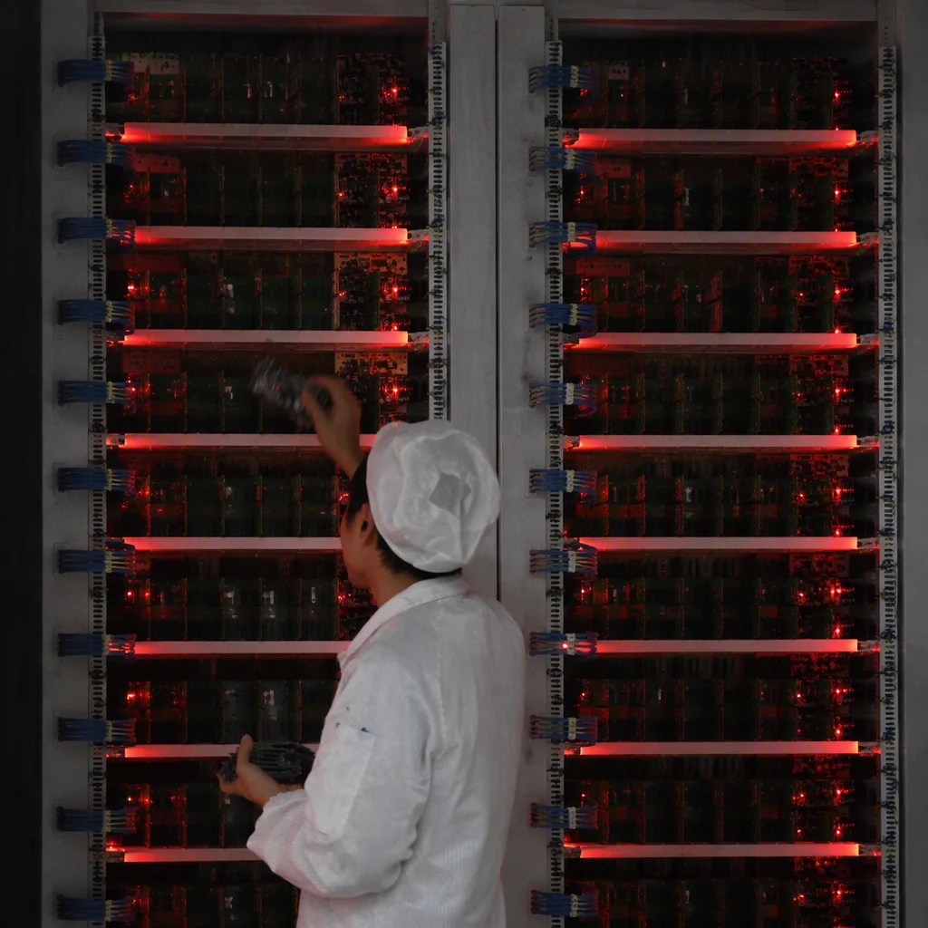 Burn-in racks with boards under load, LEDs lit